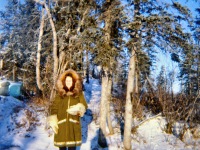 1967? Lorene in parka mukluks and wolf head mittens near our house.