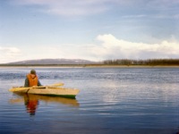 Gary in his kayak he made, on Kobuk River.